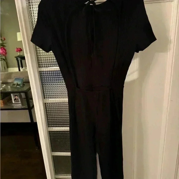 Pretty little things ribbed jump suit. Black short sleeve full open back… - Picture 2 of 12